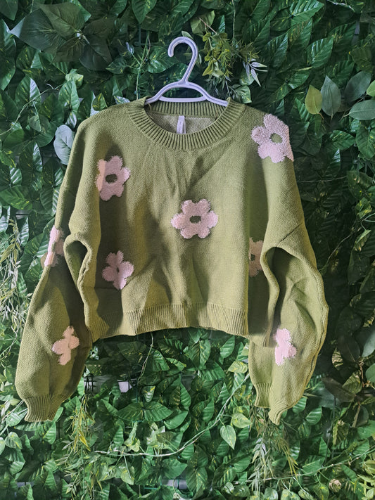 Chandail vert à manches longues avec fleurs blanches