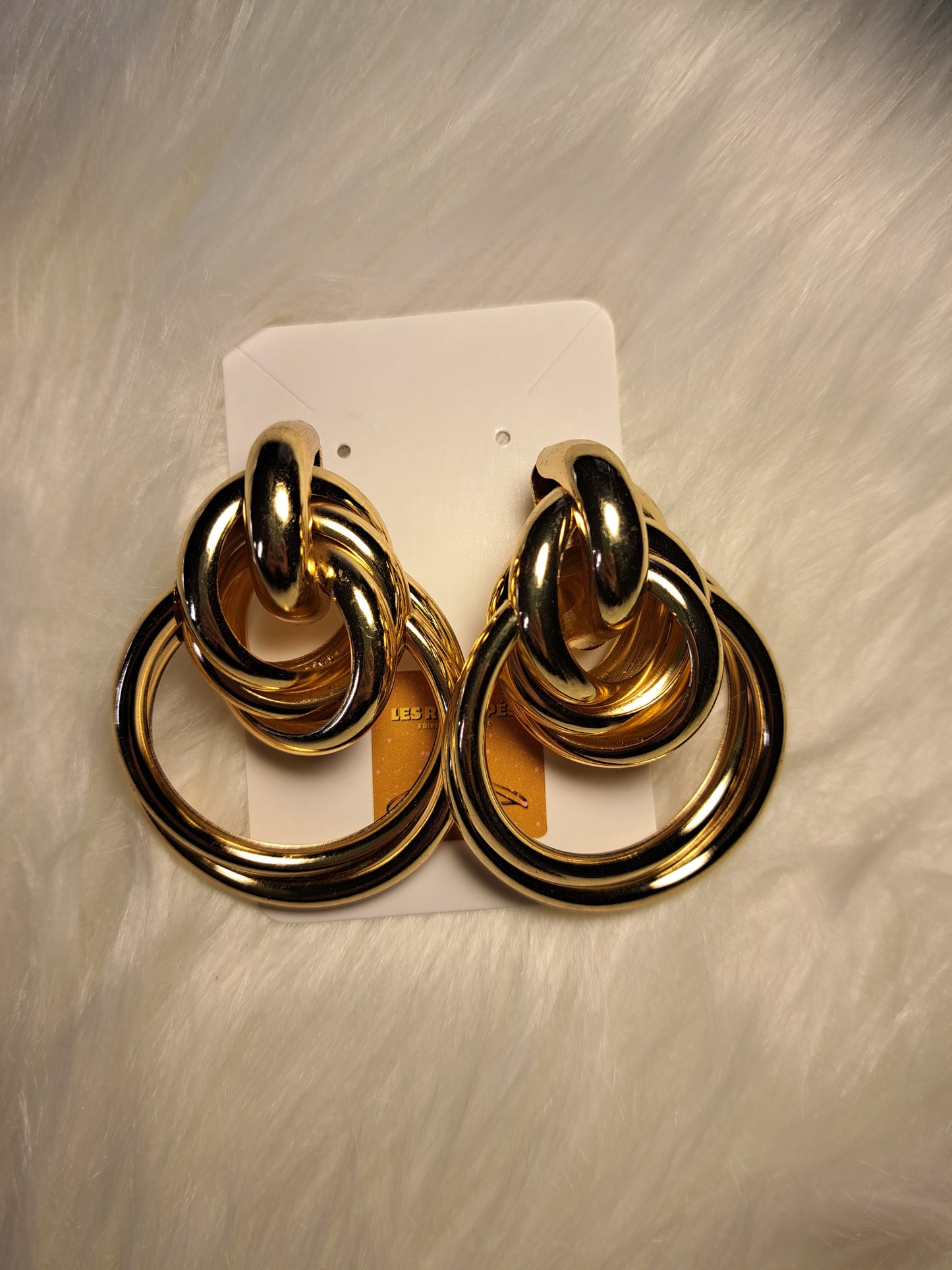 Grosses boucles d'oreilles dorés avec nœuds