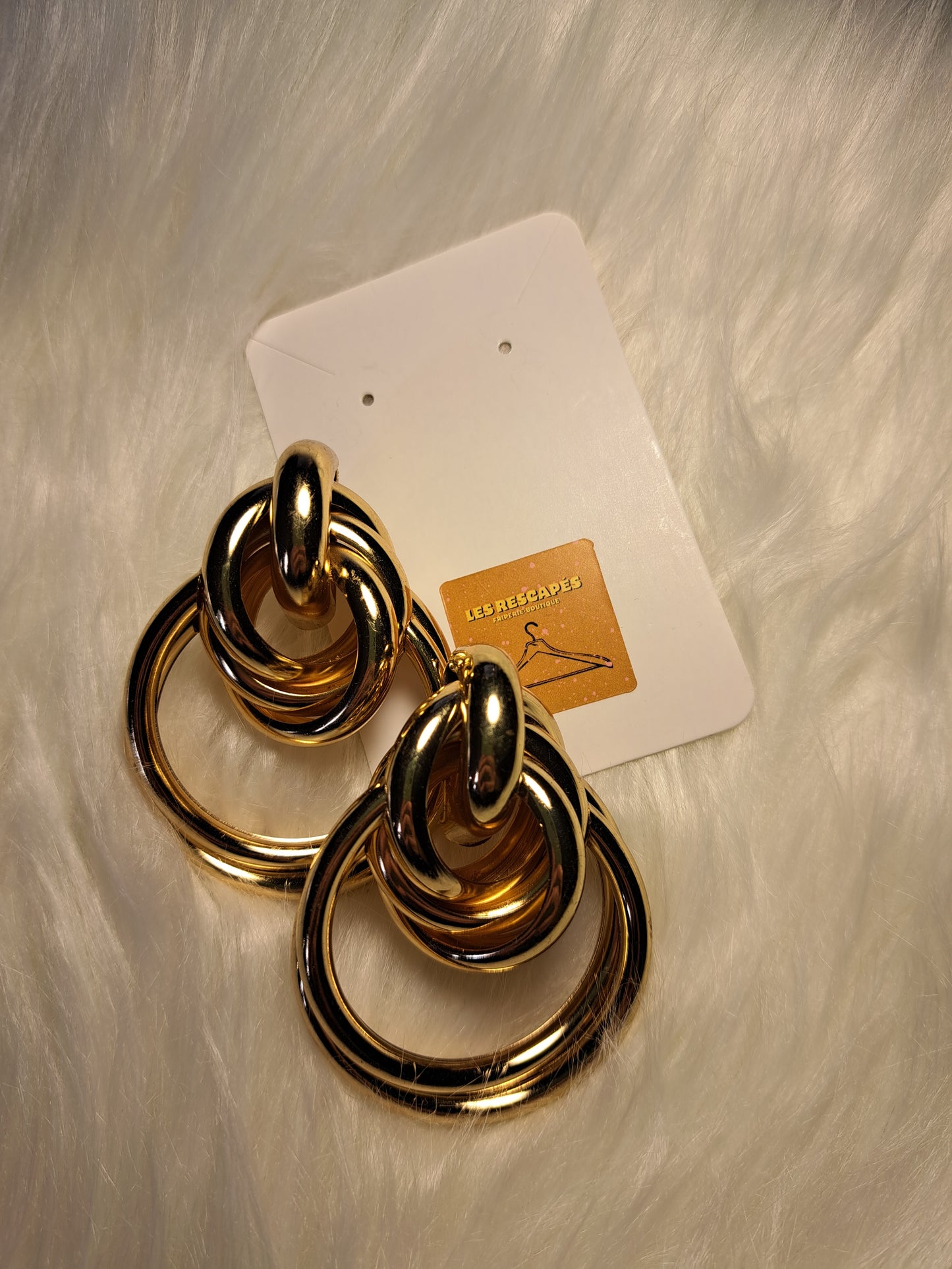 Grosses boucles d'oreilles dorés avec nœuds