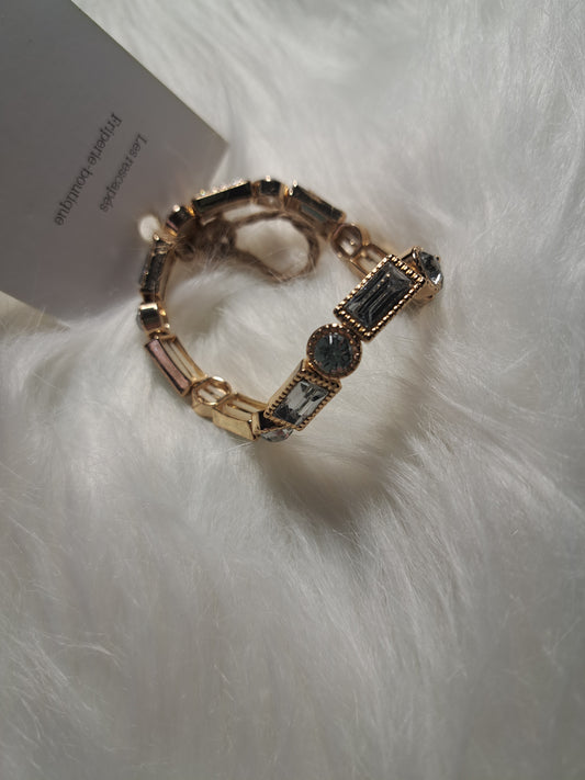 Bracelet élastique doré avec faux diamants