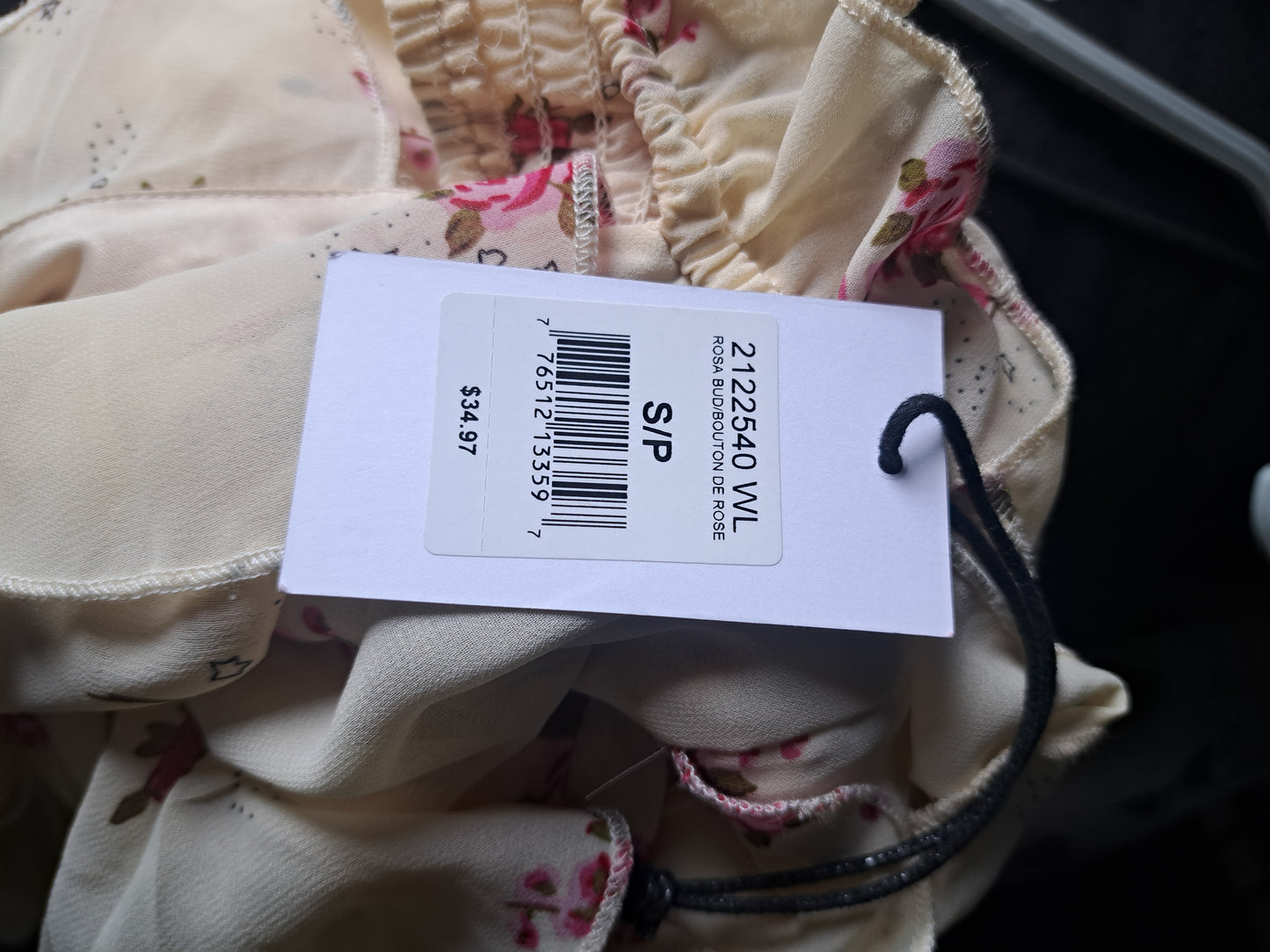 Robe beige fleurie décolletée sans manches avec étiquette