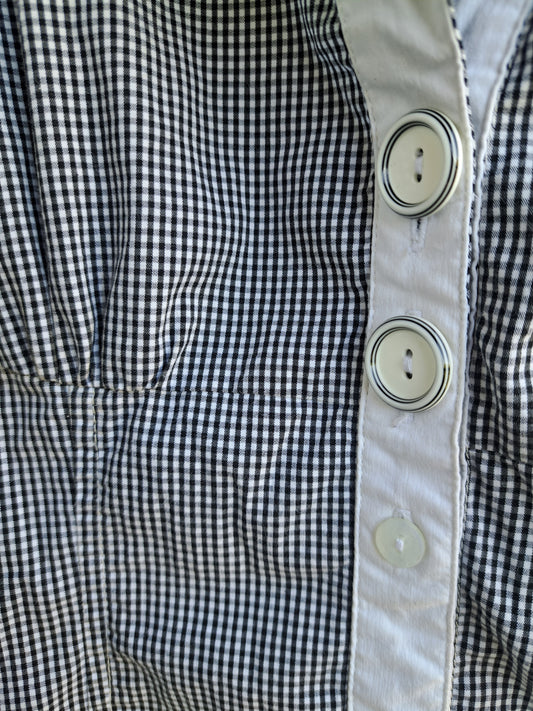 Robe-chandail long sans manche avec collet