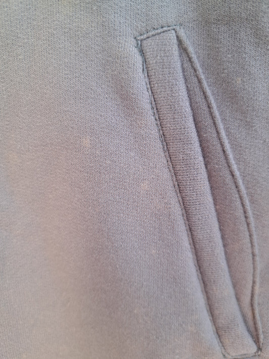 Veste chaude grise avec petit logo