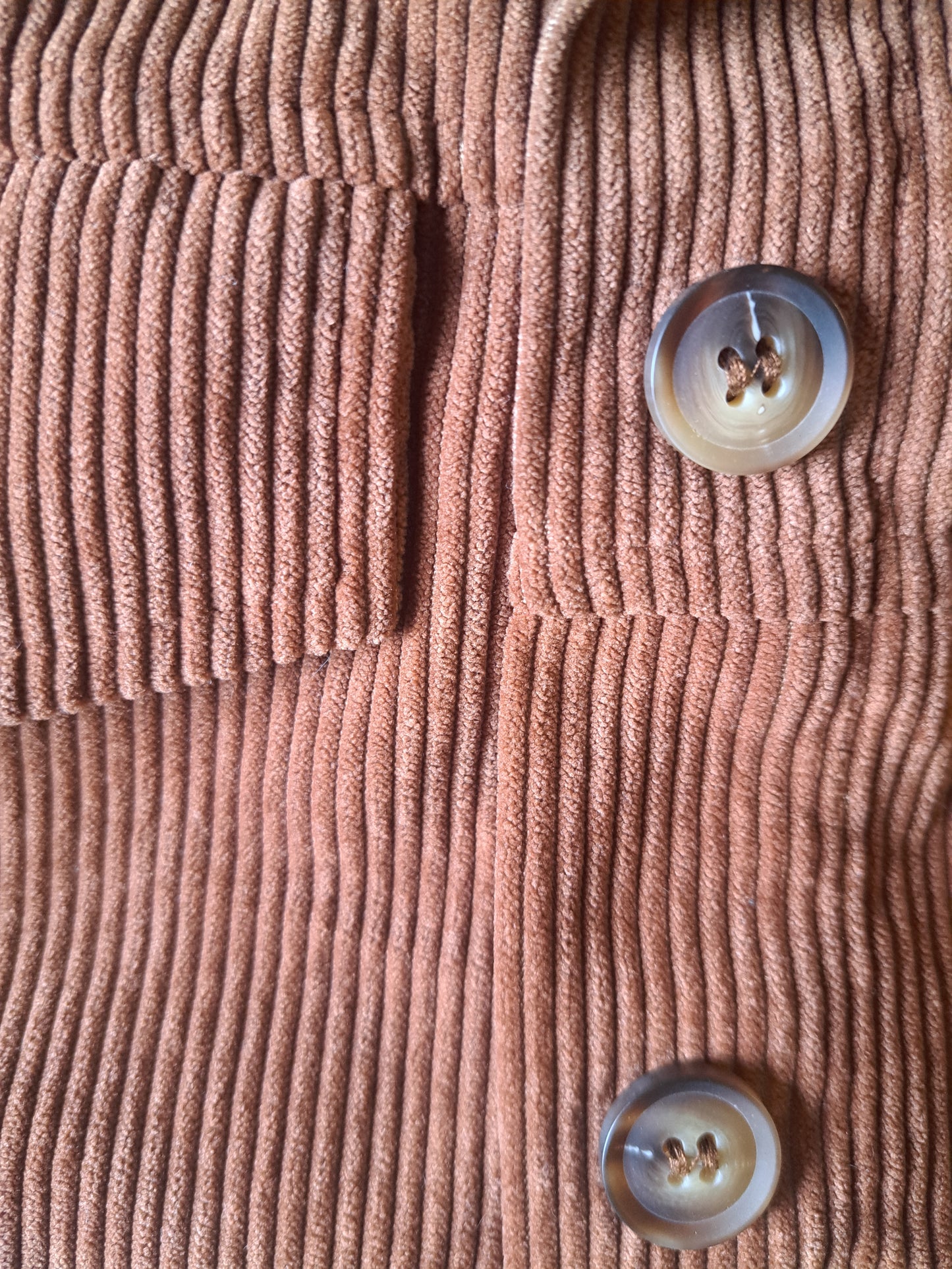 Veste orange avec boutons