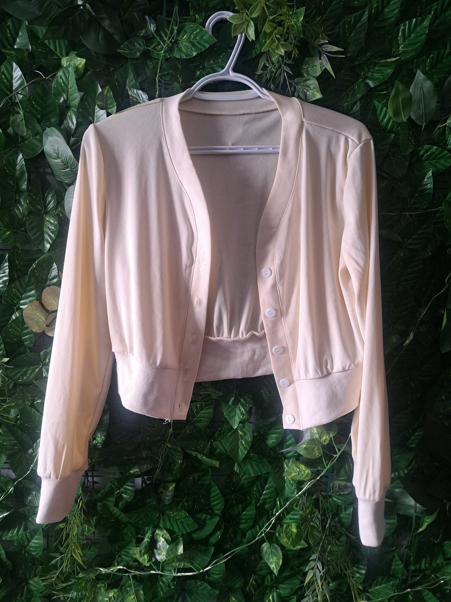 Veste blanche-crème avec boutons
