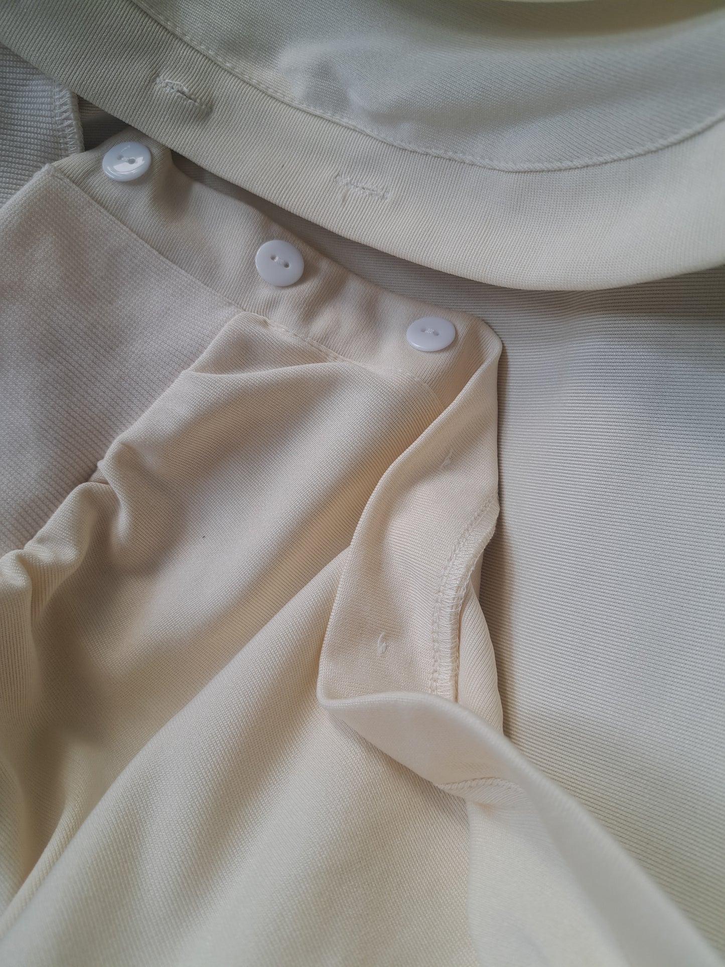Veste blanche-crème avec boutons