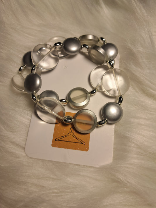 2 Bracelets élastiques avec perles de plastiques