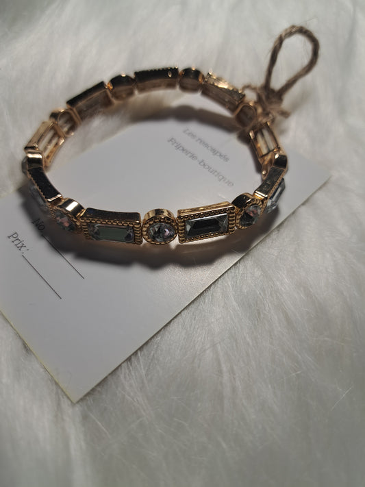 Bracelet élastique doré avec faux diamants