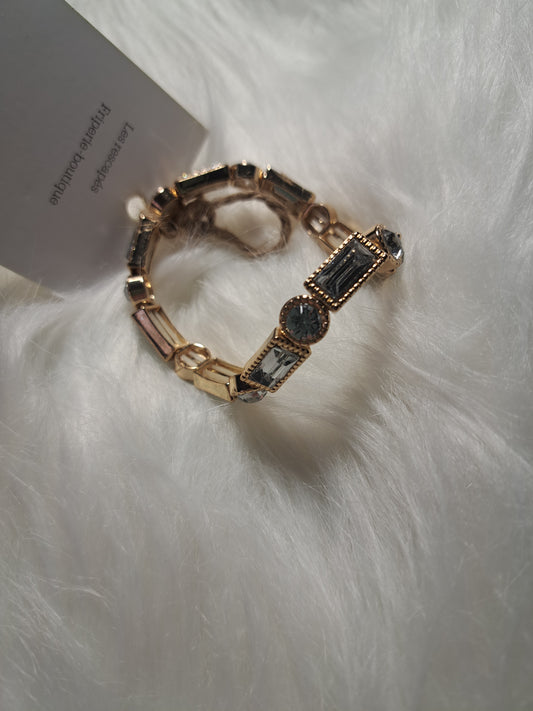 Bracelet élastique doré avec faux diamants