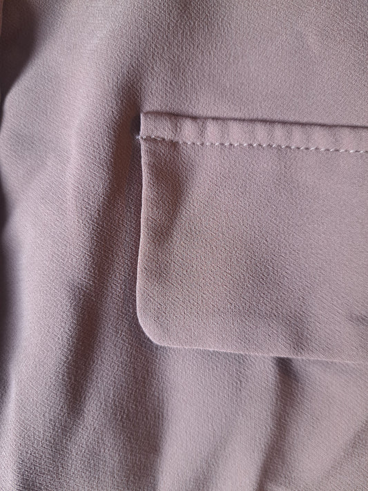 Jupe beige-rose avec boutons métalique