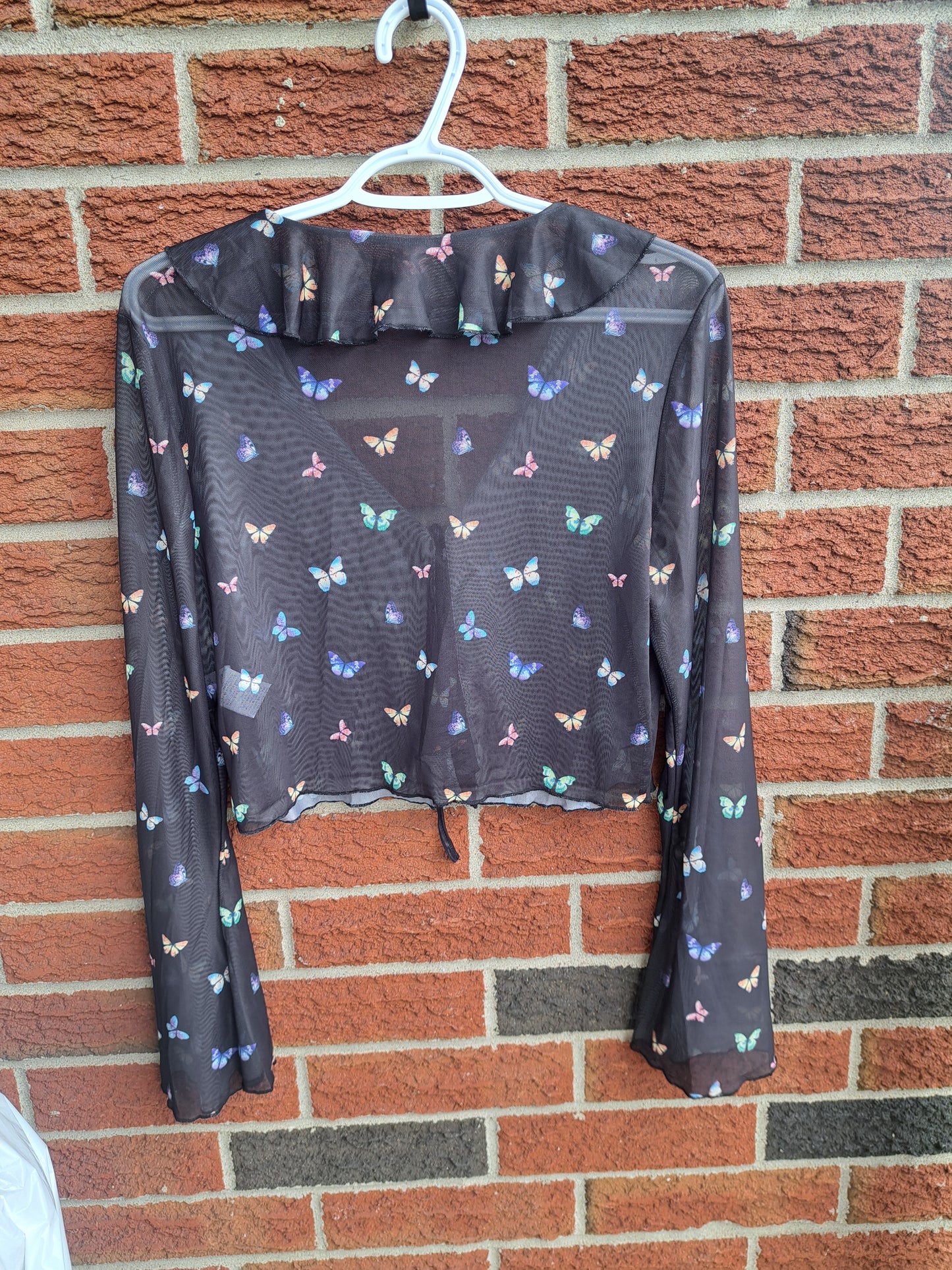 Cardigan noir semi-transparent croptop avec papillons