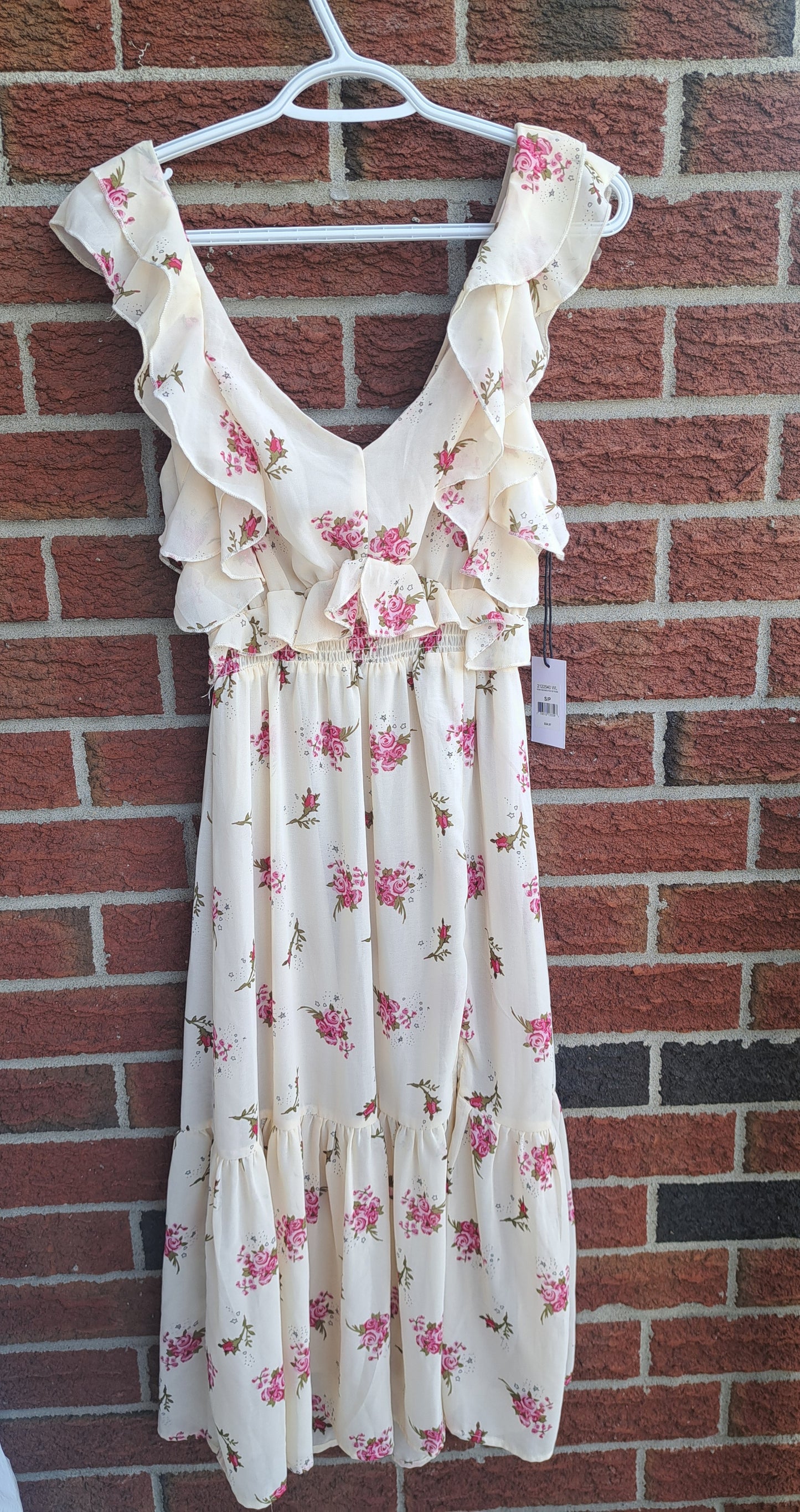 Robe beige fleurie décolletée sans manches avec étiquette