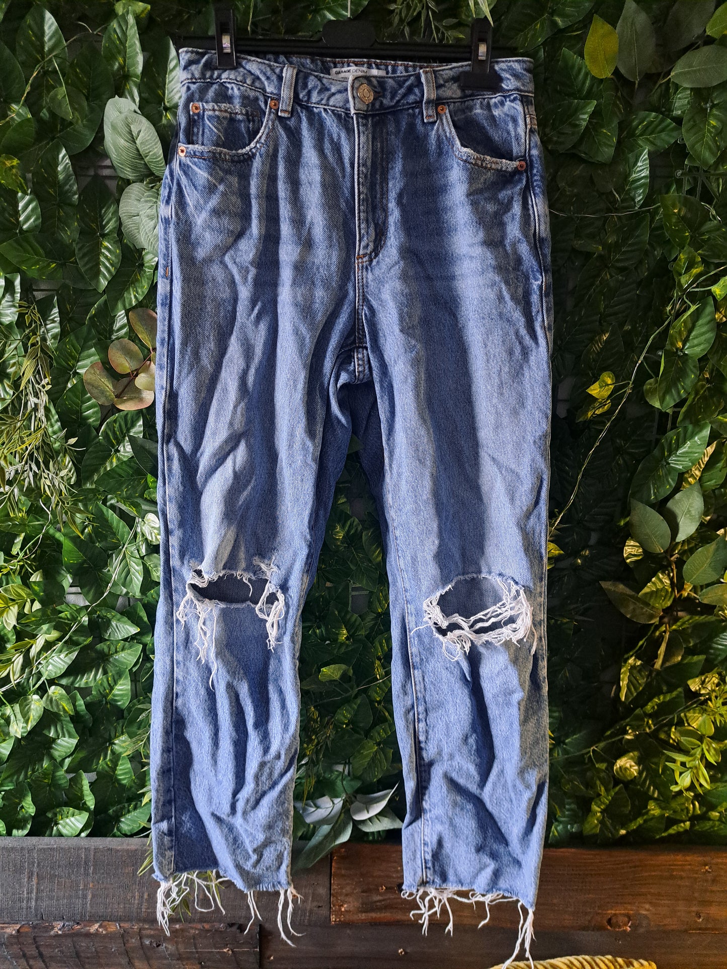 Jeans bleu pâle troué coupe vintage