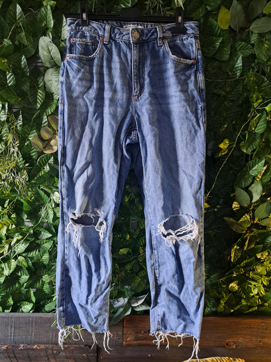 Jeans bleu pâle troué coupe vintage