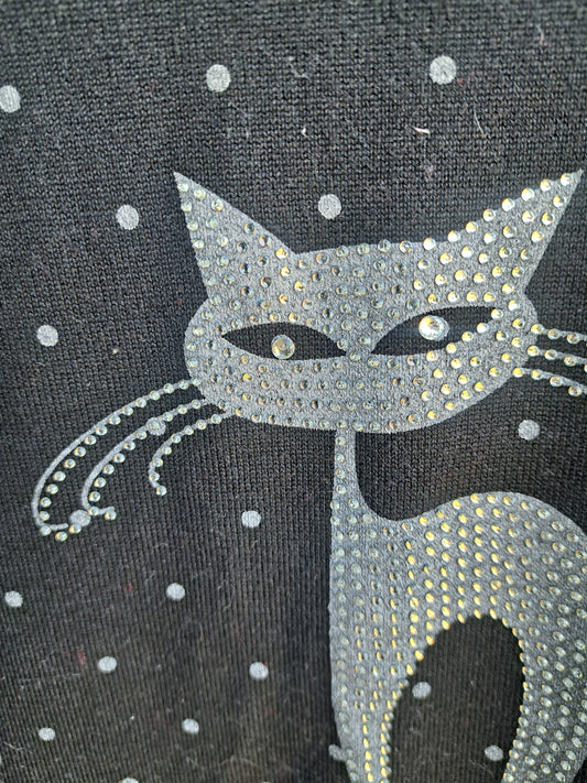 Chandail noir à manches longues avec chat