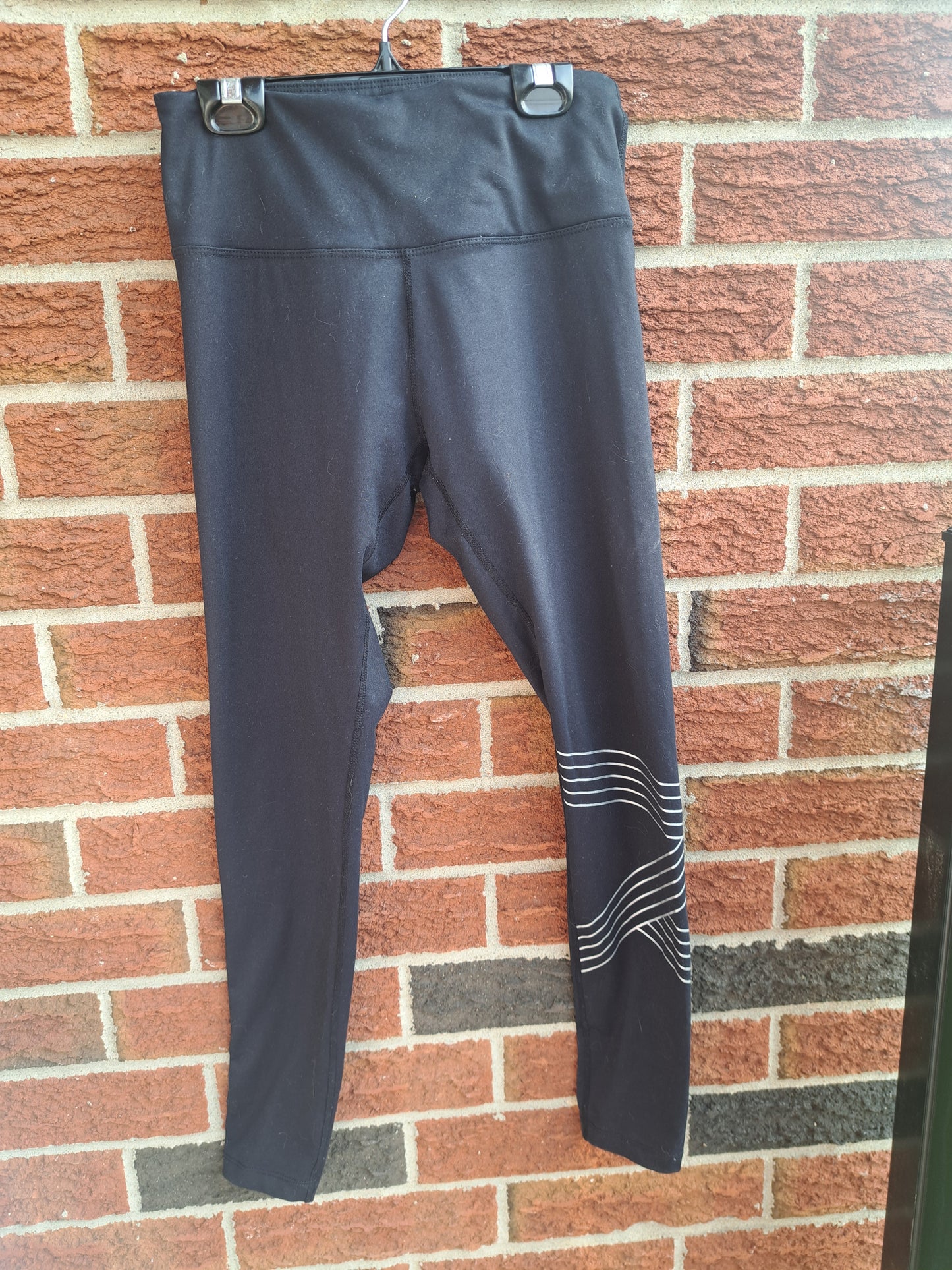 Legging noir avec motif agent dans le bas