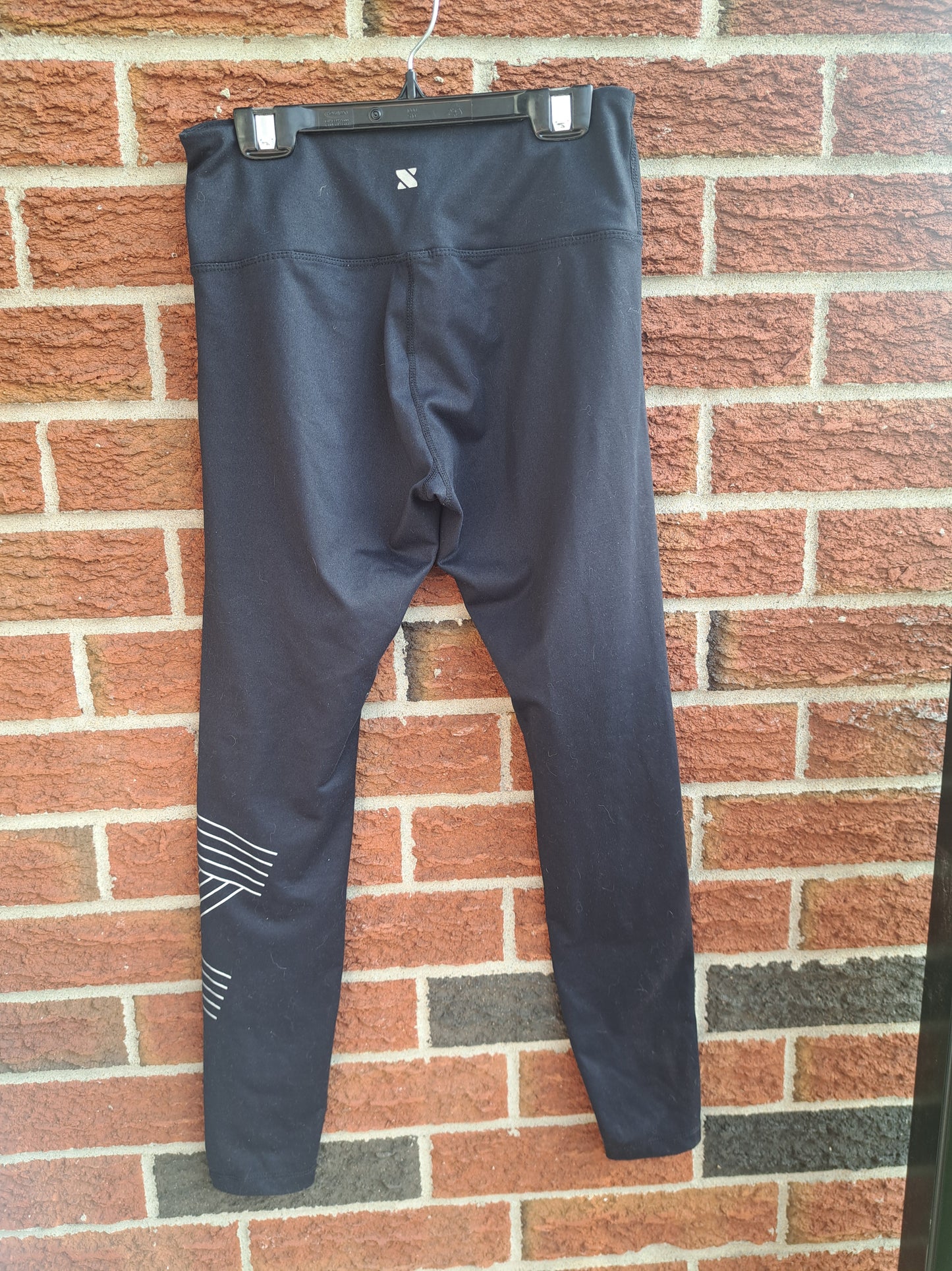 Legging noir avec motif agent dans le bas