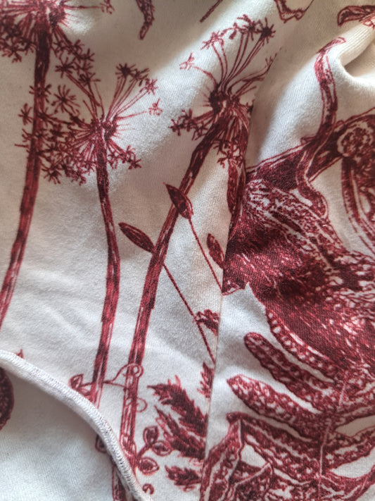 Camisole style corset blanche avec motifs rouges