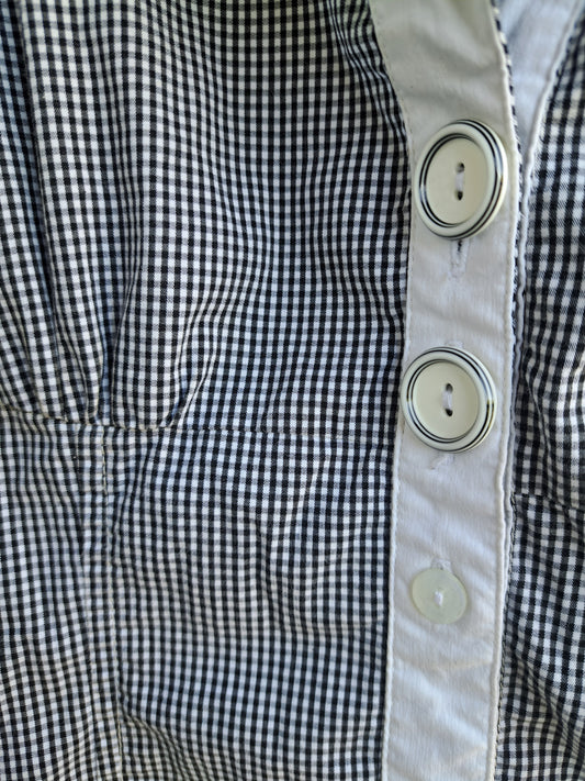 Robe-chandail long sans manche avec collet