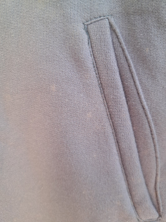 Veste chaude grise avec petit logo