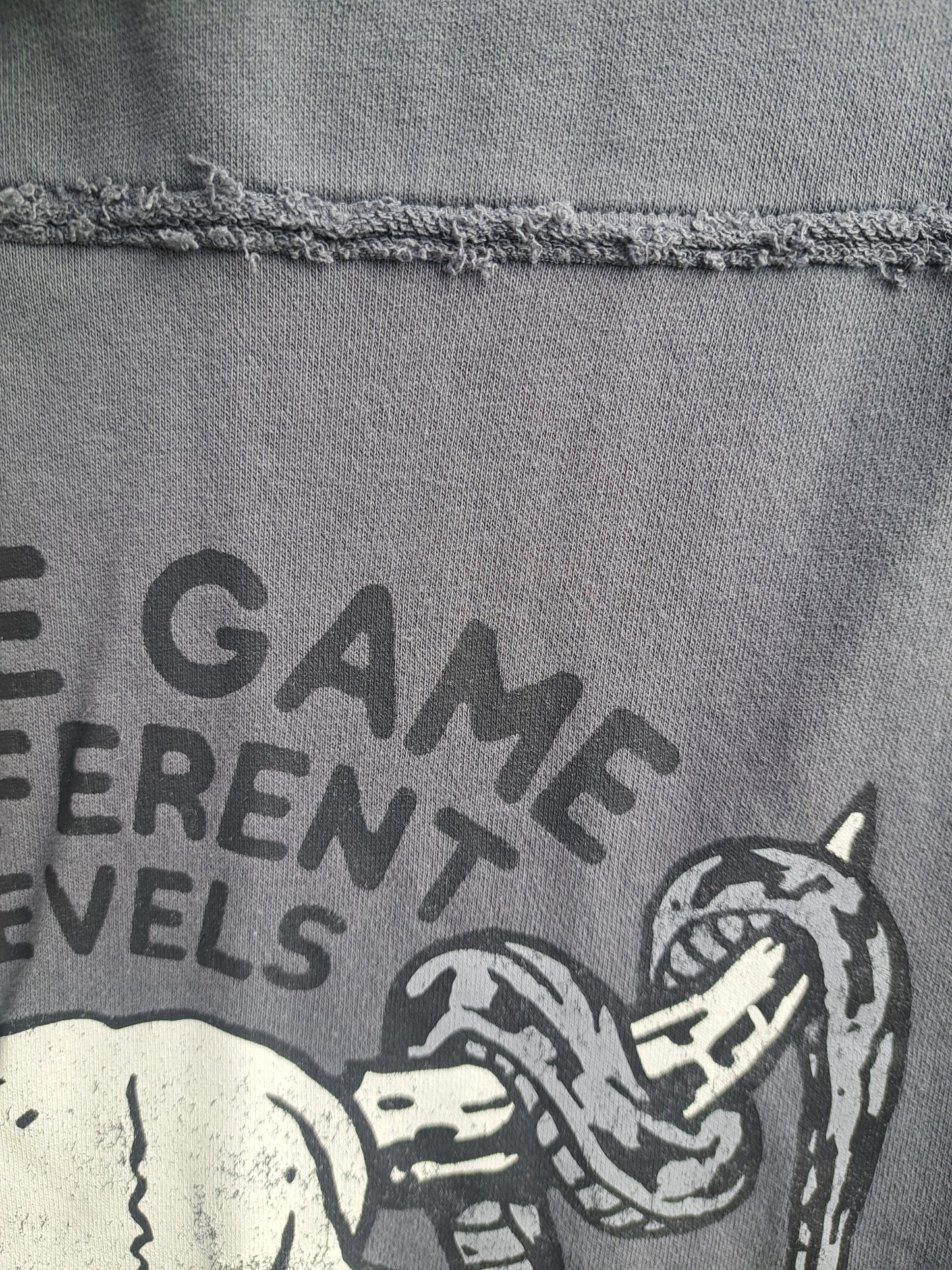 Hoodie gris sans manche avec capuche et motif tête de buffle