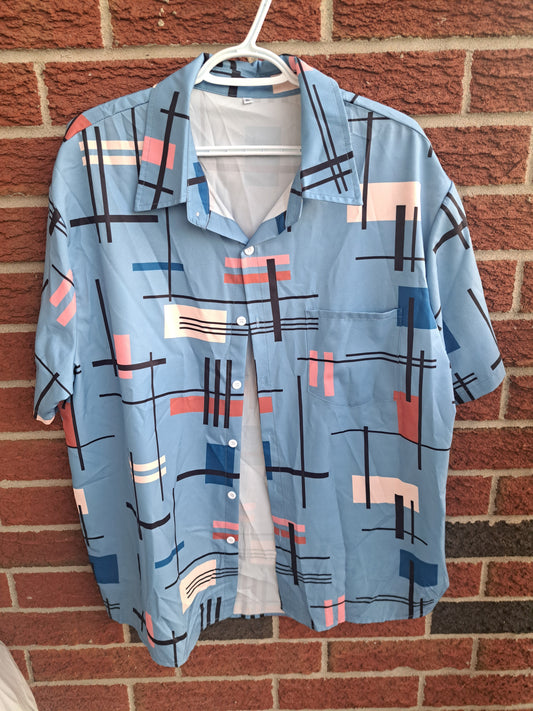 Chemise bleue avec formes géométriques