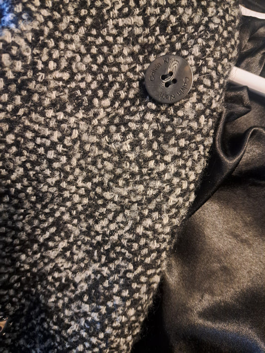 Manteau gris blanc et noir Calvin Klein